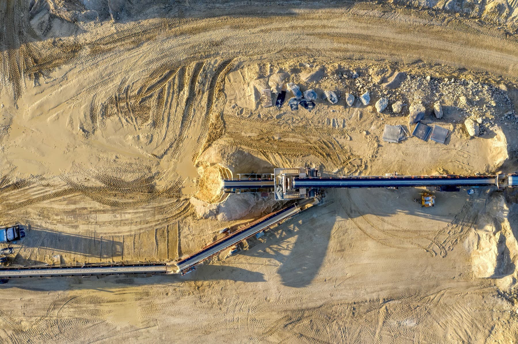 Aerial view of construction machinery and industrial earthworks